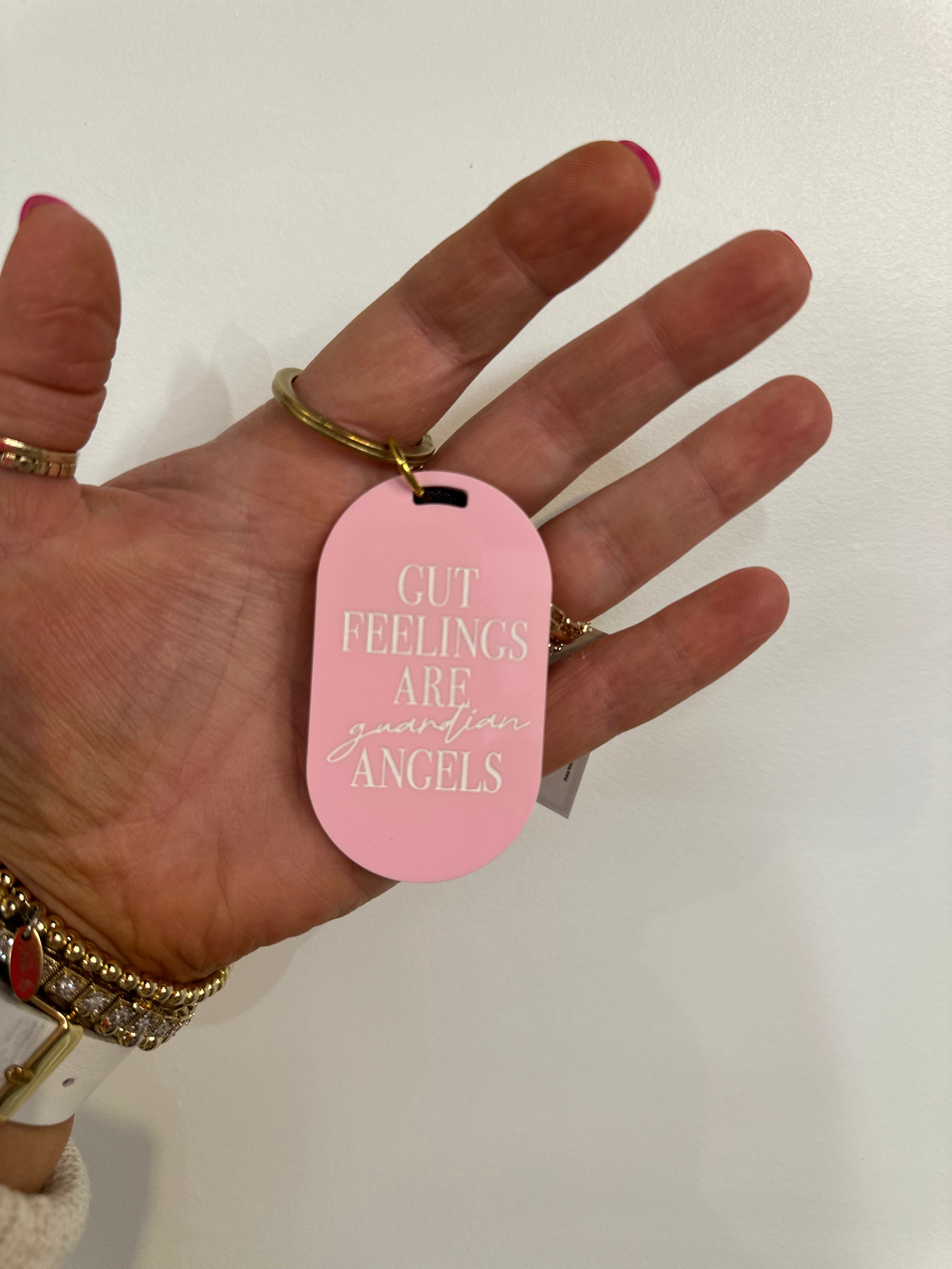 Gut Feelings Are Guardian Angels Keychain (Light Pink w/ White Writing)